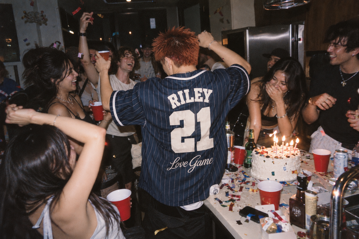 Custom birthday baseball jersey with name and age at a house party