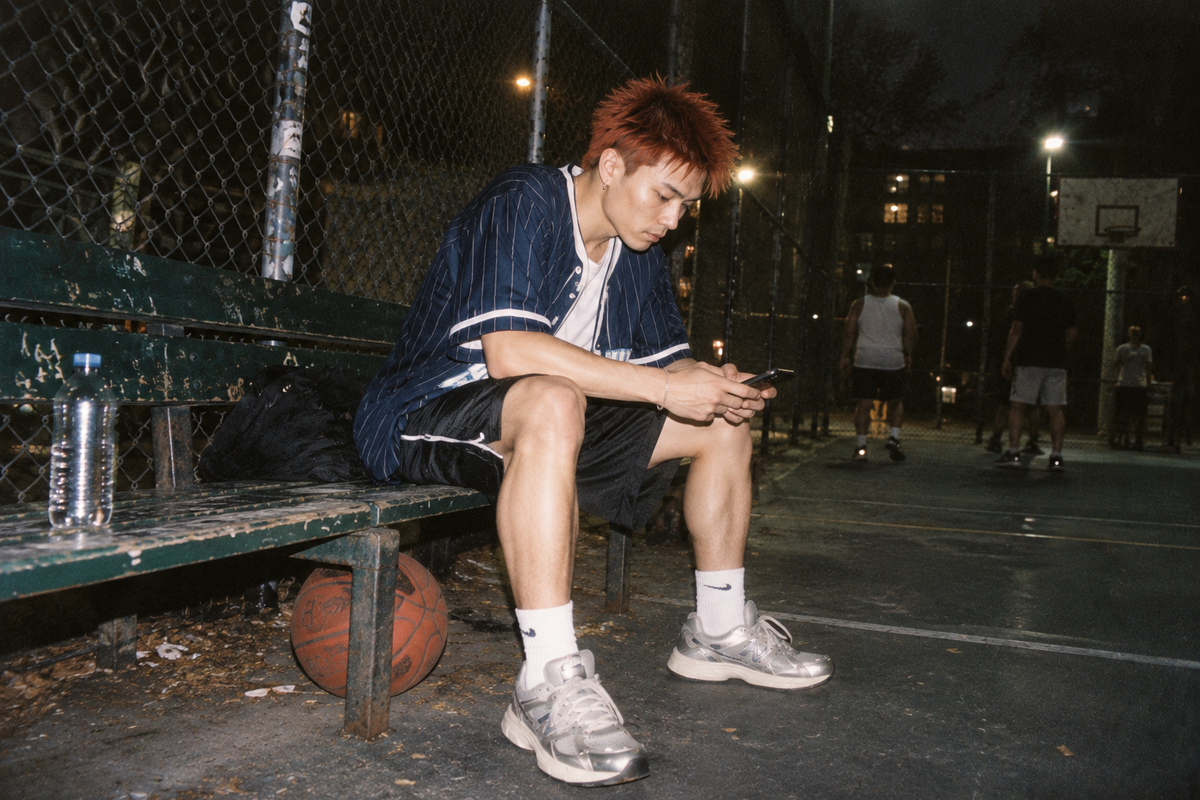 Y2K retro sport streetwear outfit with baseball jersey and track shorts