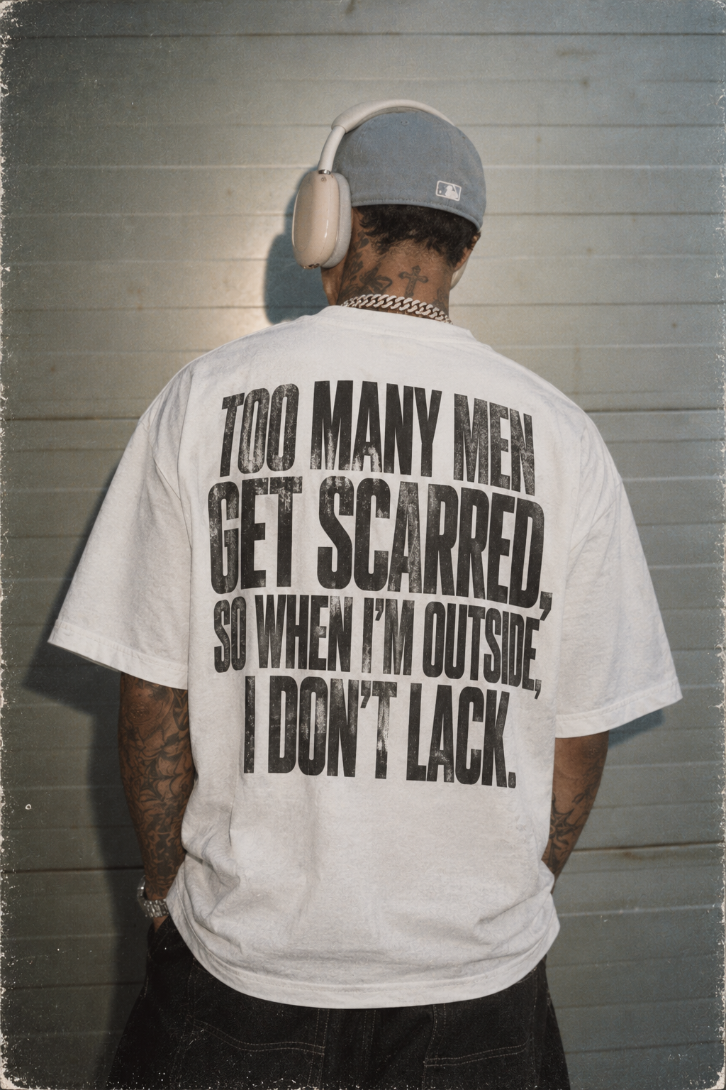 DUSKWATER Too Many Men Get Scarred oversized graphic tee with statement back print