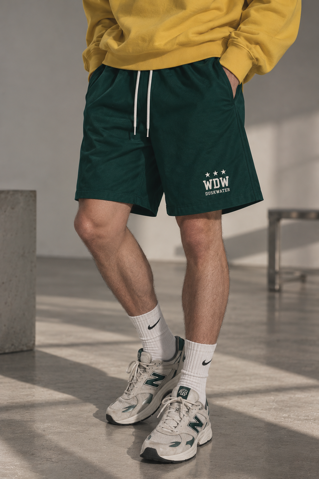 DUSKWATER WDW sport shorts in forest green with embroidered star logo