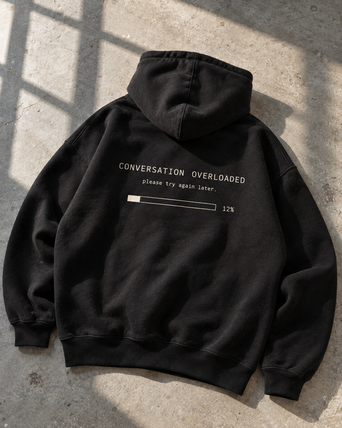 Conversation Overloaded hoodie back print, social battery error message with loading bar at 12%