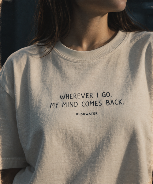 DUSKWATER Comes Back cinematic photo-print oversized tee in washed ivory